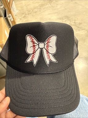 Katydid Black Trucker Hat with White Baseball Bow Patch and Red Stitching